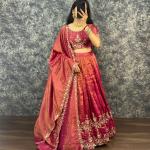 “Festive Elegance South Tissue Embroidered Lehenga Set – Wine & Lavender Edition”